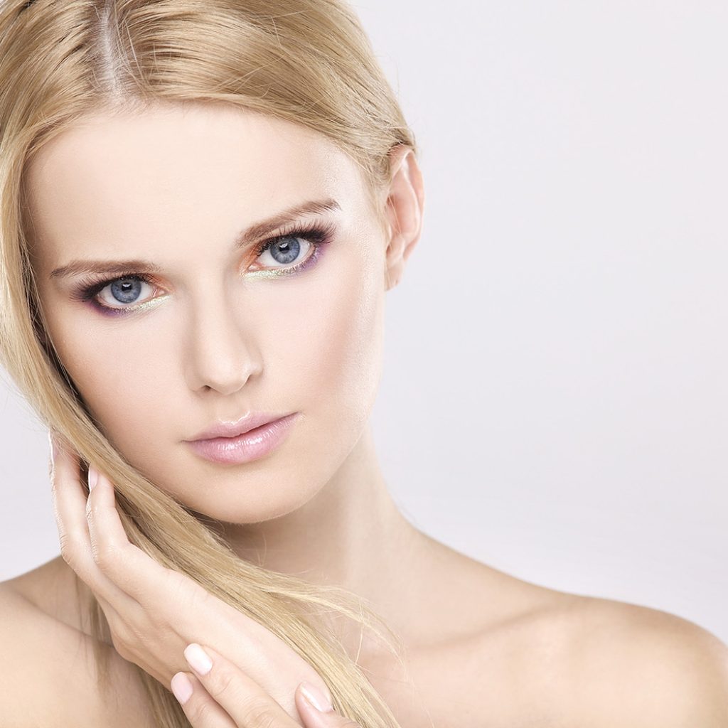 Bigstock Young pretty woman with beauti 26231903 Root Canal Singapore